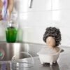 Bathtub shaped cleaning ball